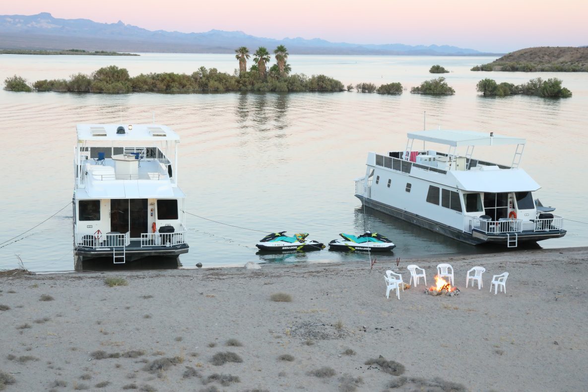 two houseboats beached at Lake Mohave