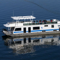 A houseboat on the water